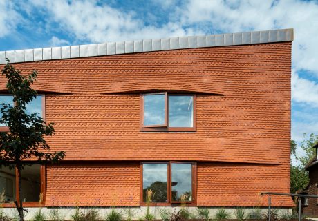 Keymer Churchill Shire Red tiles was used to transform this College using a brick cladding system solution.