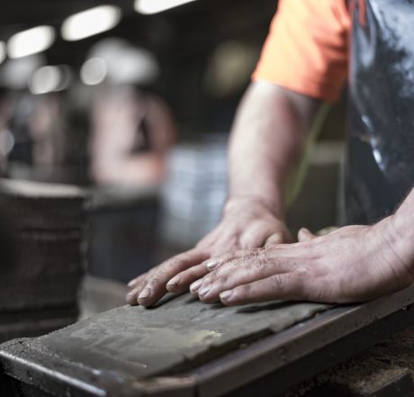 Manual roof tile production at Ewhurst production plant in UK.