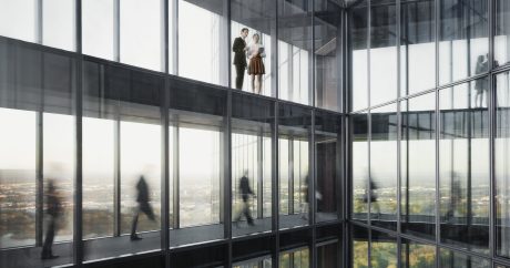 People walking on connecting bridges at Vienna Twin Towers