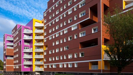 Collective dwelling with three buidings : Vaucluse, Vercors et Vendée. Siding's implementation. Résidence Les Vergers, Quartier Vétérans-pont-de-Bois, Rue des vergers 59650 Villeneuve d'Ascq. Panels Argeton Argelite Rouge Brun.