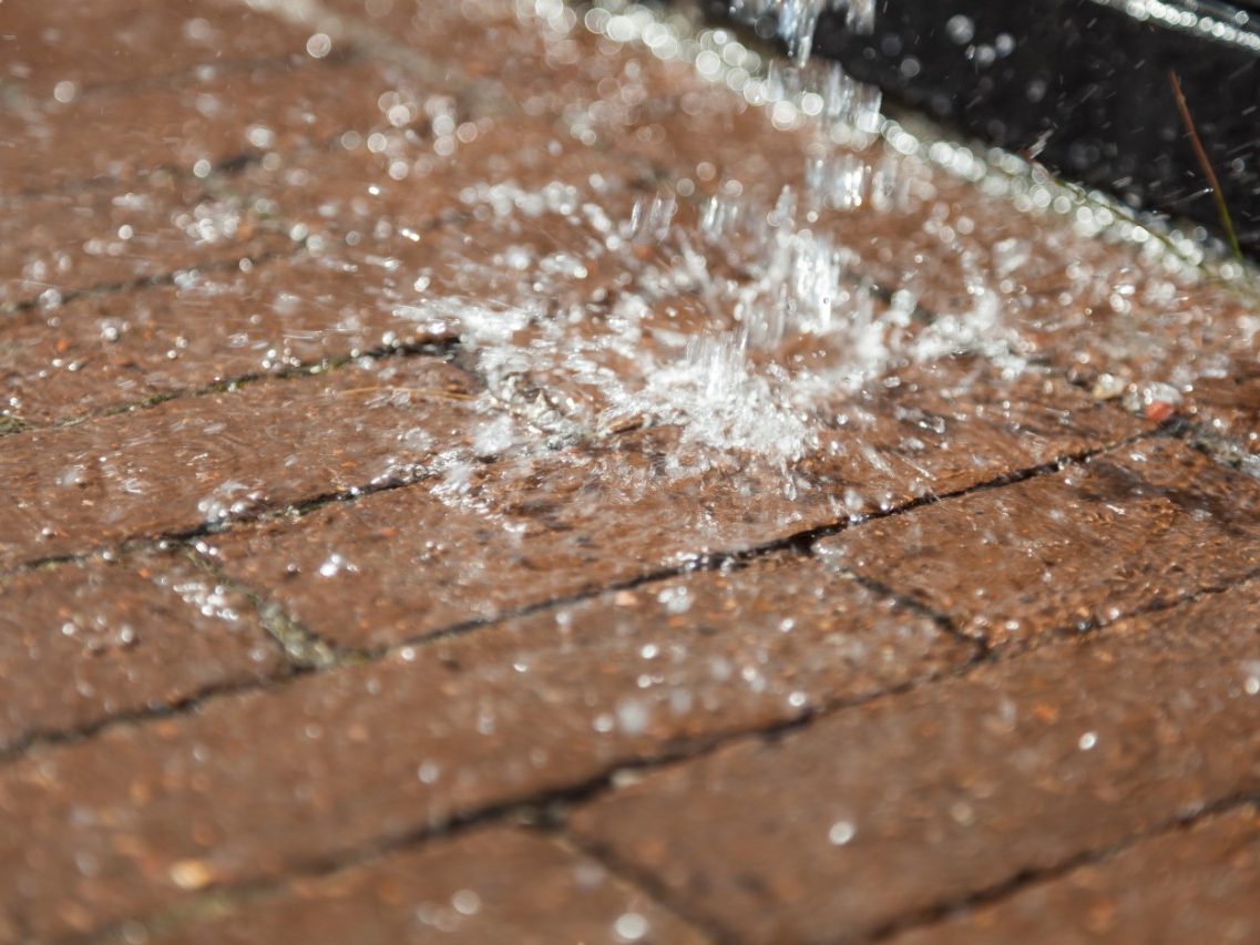 Water is falling on pavers